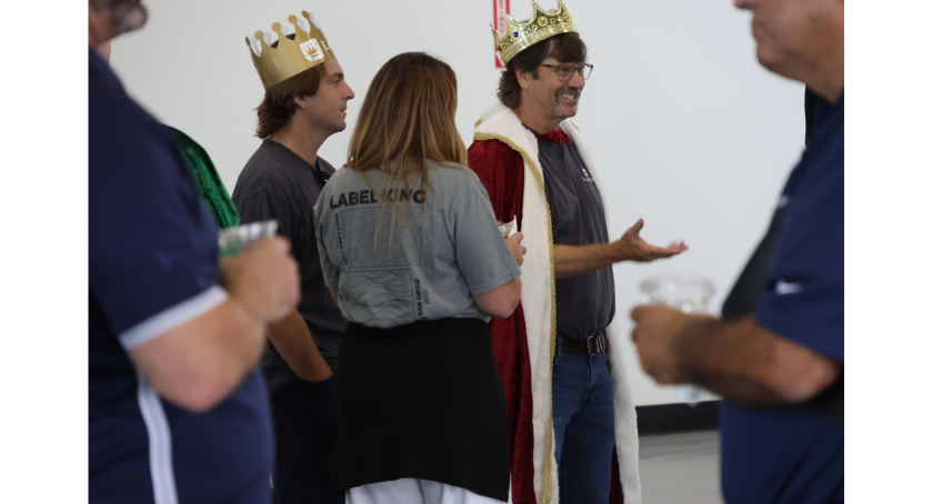 Max Parker (L) and Rober Parker wearing crowns and greeting visitors.